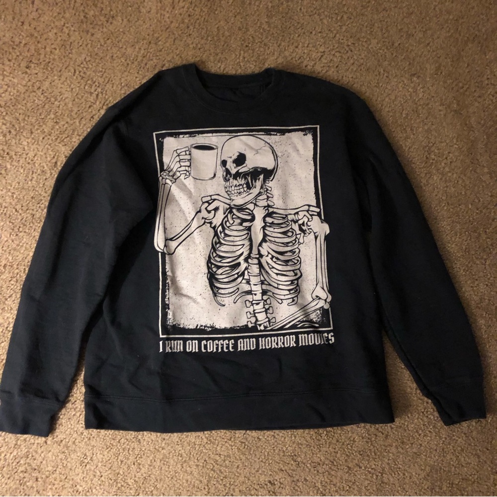 Sold! Graphic crewneck “I run on coffee and horror movies” 💀 ☕️